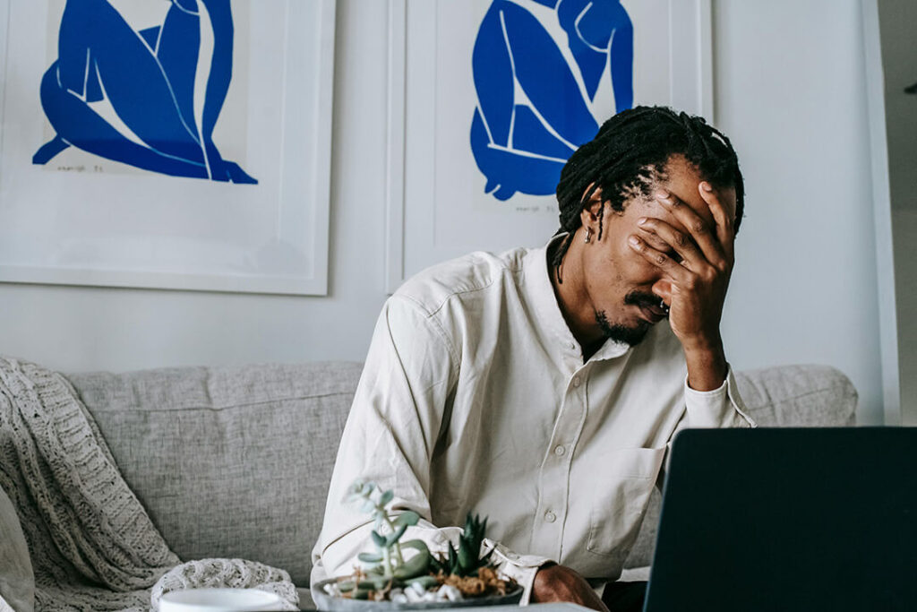 Decorative image of a stressed man to show him making home-buying mistakes